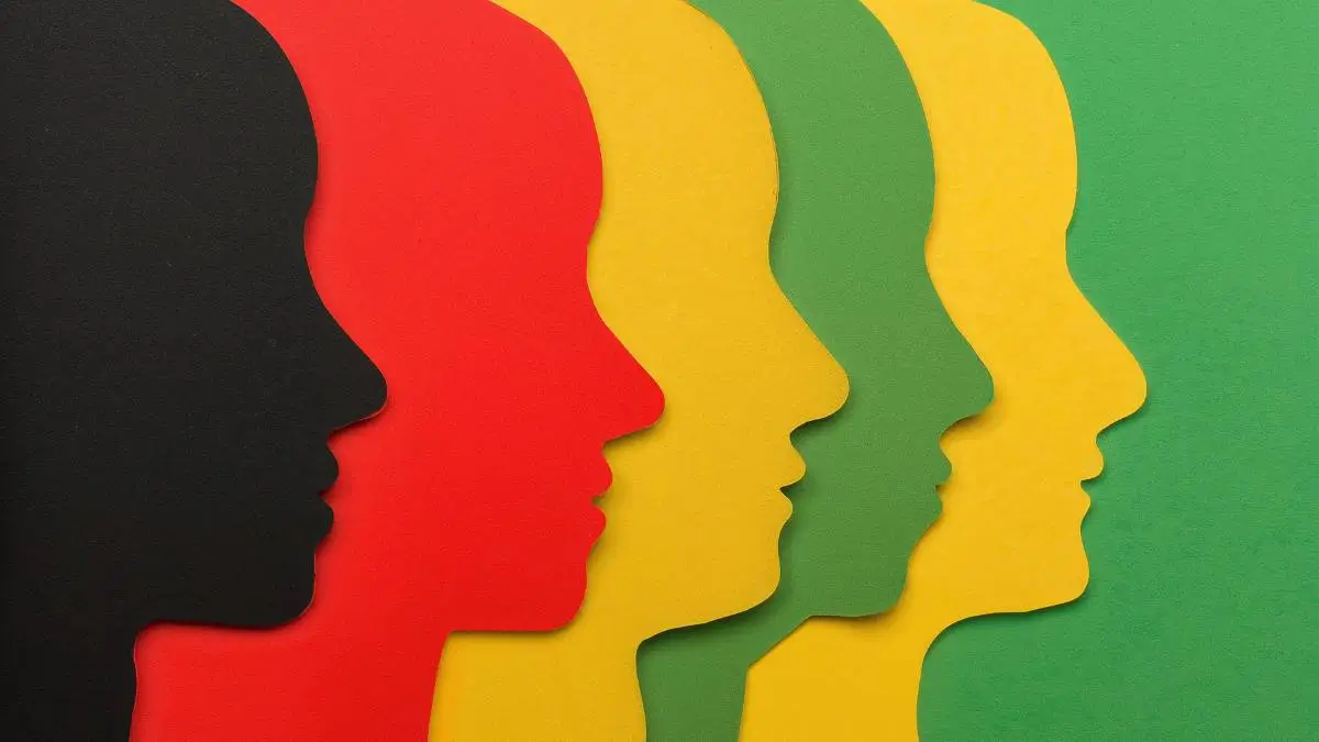Silhouettes de profil superposées et colorées, symbole de la diversité des profils investisseurs, illustration d’un article sur le profil investisseur avec le Cabinet Basile Debec.